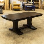 Geometric pedestal base of Contempo Solid Wood Dining Table, handcrafted in maple with clean modern lines.00